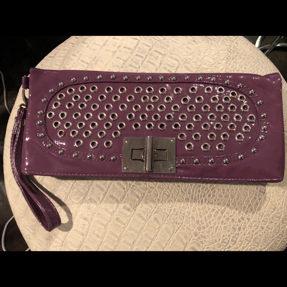 Purple leather clutch